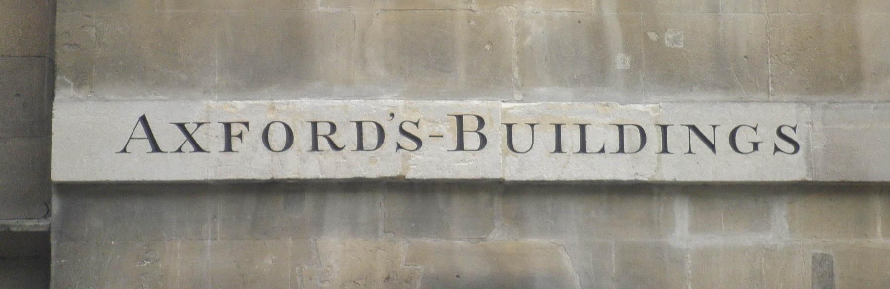 Image: weathered street sign for Axford's Buildings prior to restoration